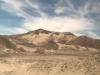 Het landschap verandert, zandduinen gaan over in uitlopers van de Andes